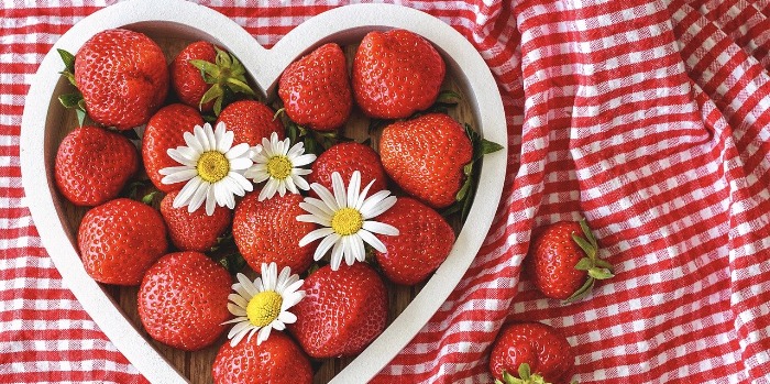 strawberries in a heart shaped bowl