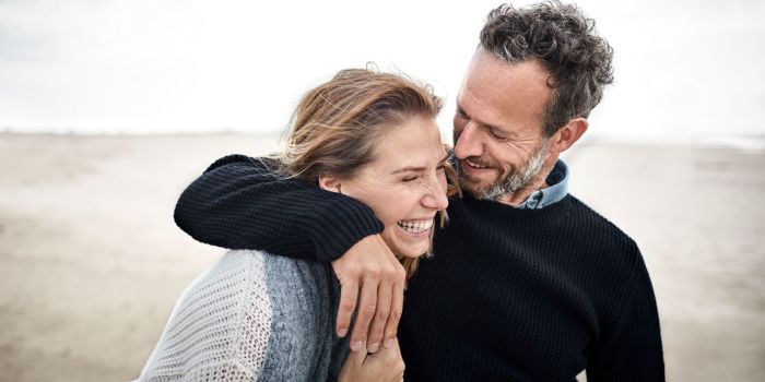 two people having fun at the beach