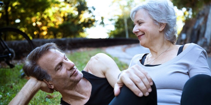 two people chatting outdoors