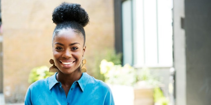 woman smiling outside