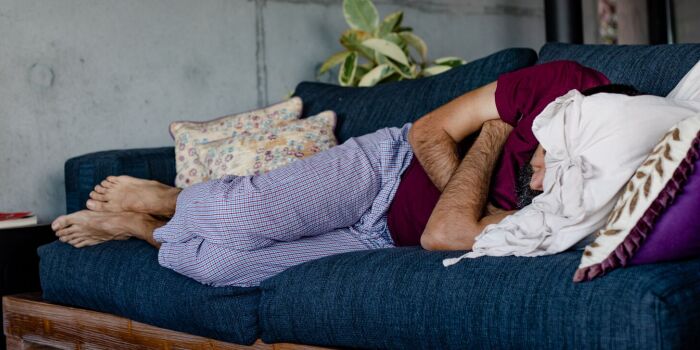 man sleeping on the sofa
