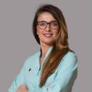 Headshot of Karolina Wolowiec, Specialist Oral Surgeon who places implants at Bupa Dental Care Moorgate