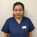 Headshot of Carine Gurung. trainee dental nurse at Total Dental Care Folkestone