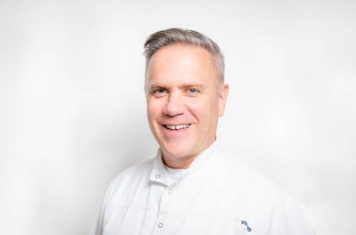 Headshot of Anthony Zybutz, Advanced Aesthetic Dentist at TDC (Total Dental Care) Implant Centre Harley Street 